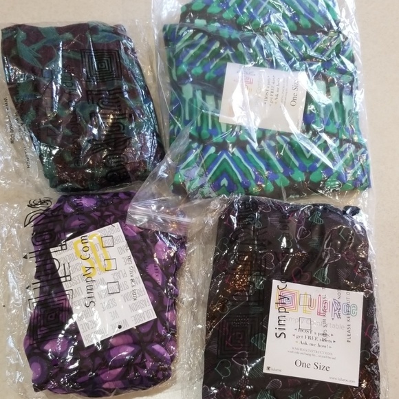 LuLaRoe Pants - Lot of 4 BNWT Lularoe printed Leggings One Size